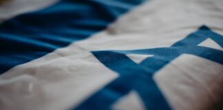 예멘 기독교 공동체, 이스라엘-하마스 분쟁 후 급속 악화 close up of the flag of israel